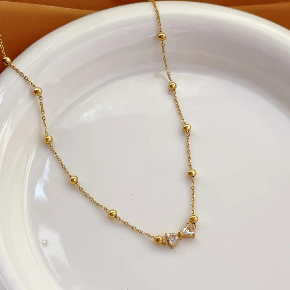 Rhinestone bow necklace