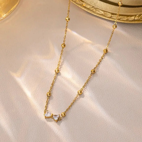 Rhinestone bow necklace