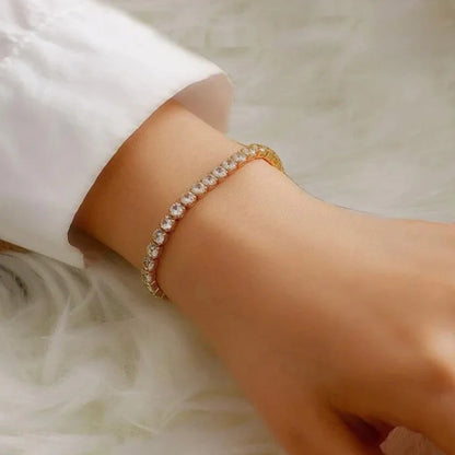 Golden adjustable tennis bracelet